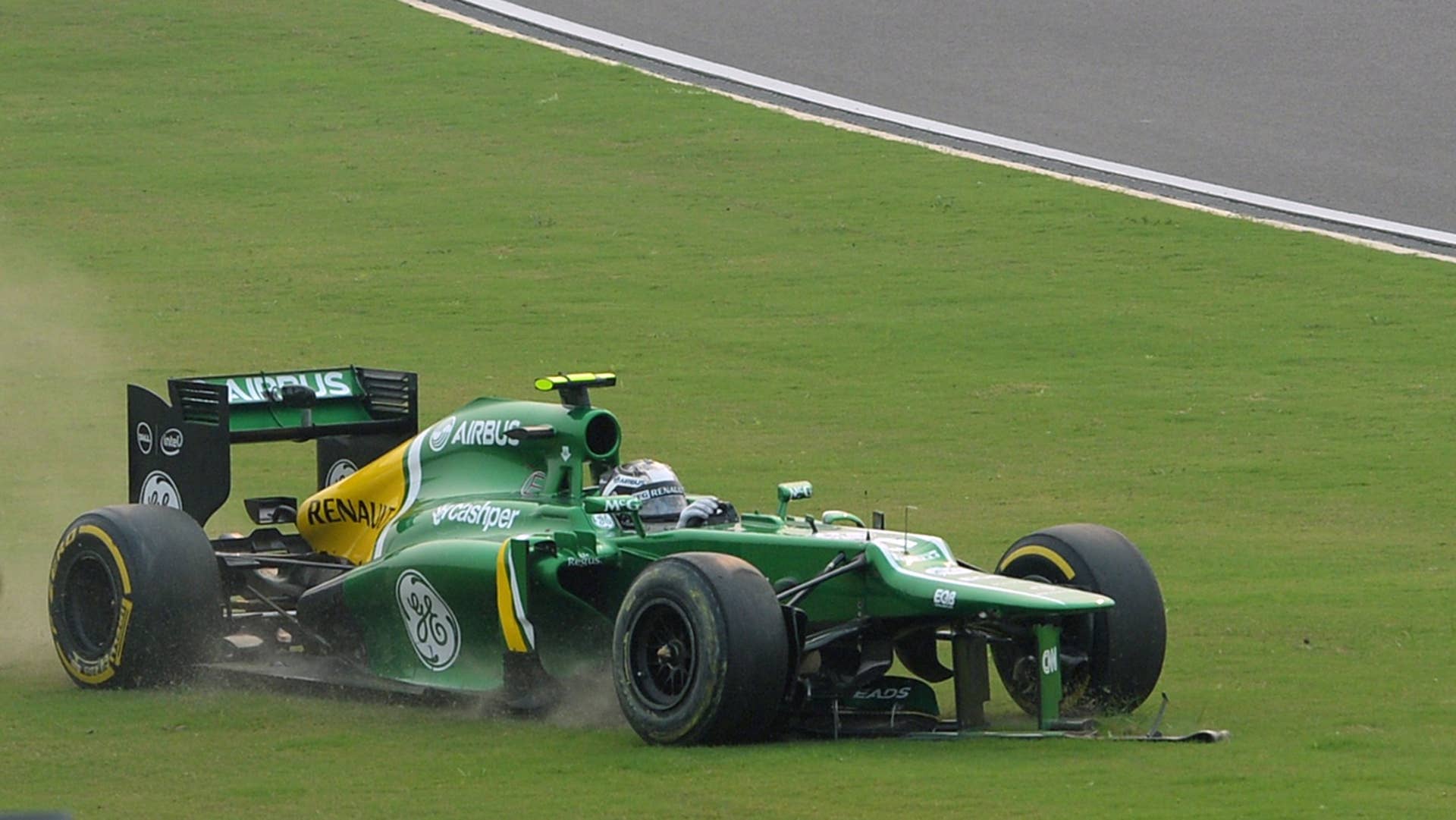 Caterham driver Giedo Van Der Garde of the Netherlands runs off the track during the Formula One Indian Grand Prix 2013 at the Buddh International circuit in Greater Noida, on the outskirts of New Delhi on October 27, 2013.   AFP PHOTO/Indranil MUKHERJEE        (Photo credit should read INDRANIL MUKHERJEE/AFP/Getty Images)