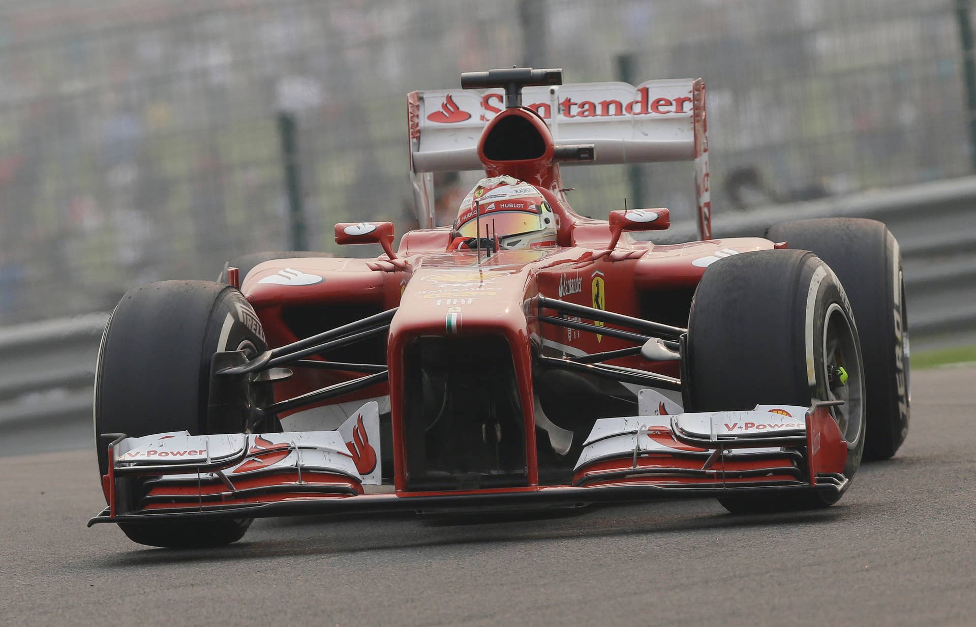 Ferrari driver Fernando Alonso of Spain steers his car during the Indian Formula One Grand Prix at the Buddh International Circuit in Noida, India, Sunday, Oct. 27, 2013. (AP Photo/Mark Baker)