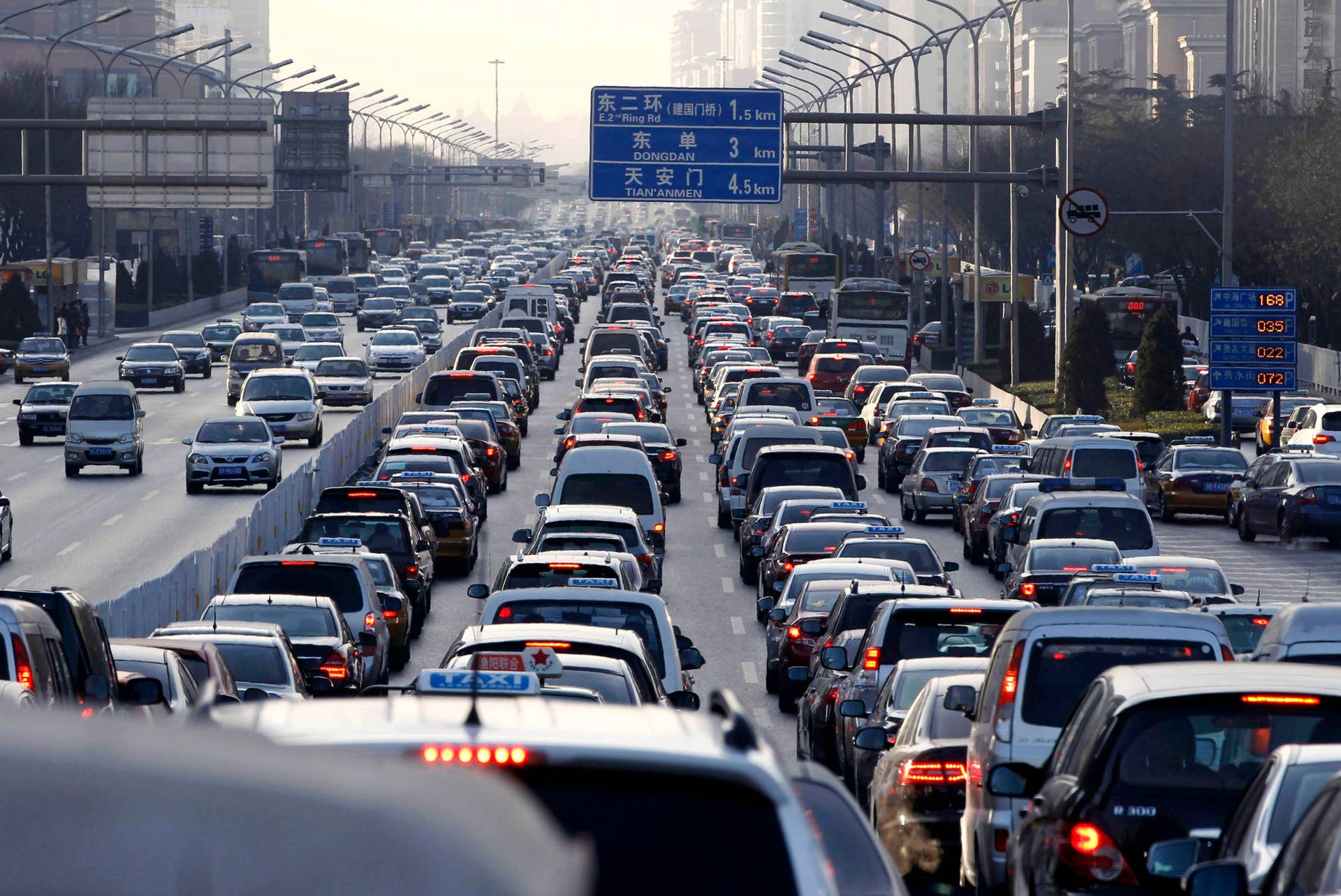 FILE - In this Monday, Jan. 10, 2011, file photo, vehicles are stuck in a traffic jam during weekday rush hour in Beijing. China, which overtook the U.S. late last year as the world's largest oil importer, has the single biggest influence on global demand for fuels. China's consumption has risen 28 percent in five years, to 10.2 million barrels per day last year. (AP Photo/Larry Downing, Pool, File)