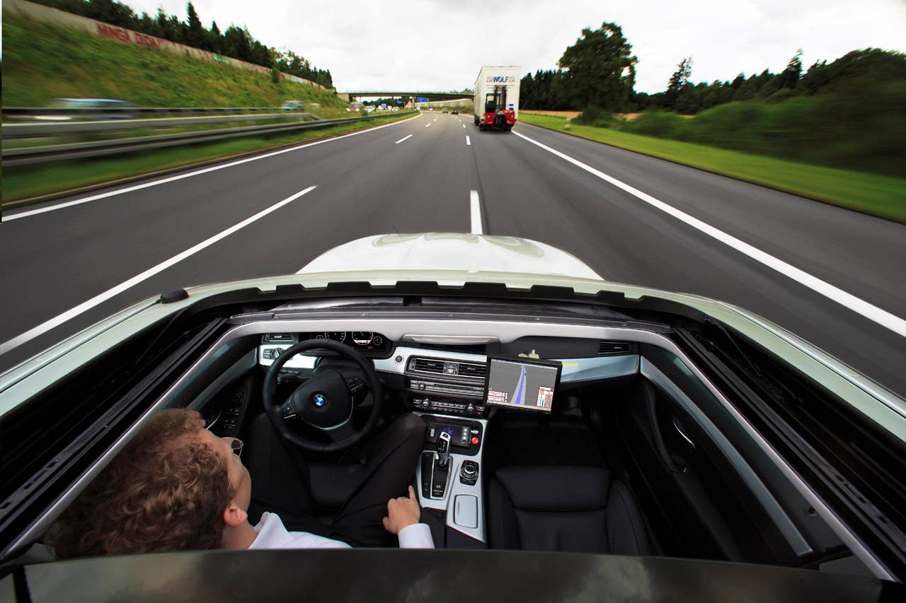 Research project Highly automated driving on highways - Dr. Nico Kmpchen on a test drive (08/2011)