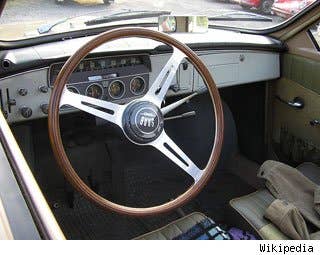 Three-speed column shifters -- know as a"Three on a Tree" -- first appeared on cars in the 1930s and became a common feature on cars in the 1940s and 50s. Instead of being mounted on the floor next to the driver, the shifter was mounted on the steering column. Mechanically similar to floor-shifters, column-shifters allowed for more passenger room with front bench seat, which, as we just learned, are also officially a thing of the past.  The last manual-shift column shifter was turned out in 1987. Since then, automatic transmission column shifters have beenfading away as well. And the 2013 Chevy Impala, with the last bench seat option, is also the last new car to be offered with a column shifter.