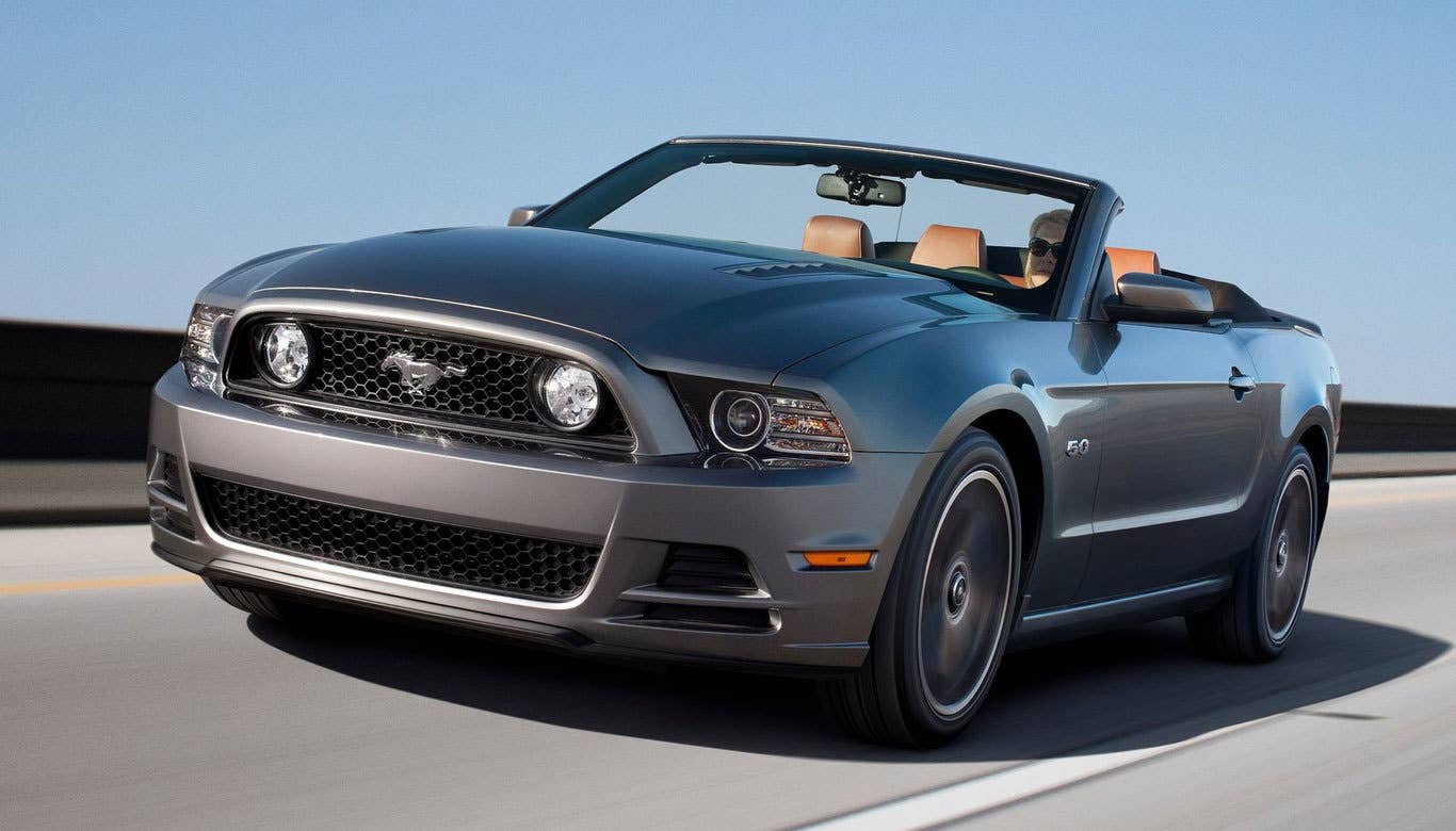 Sticker Price: $35,310 - $40,310 Invoice Price: $32,573 - $37,186 Fuel Economy: 15 mpg City, 26 mpg Highway With its retro looks and burly 5.0-liter V8 engine, theFord Mustang GT embodies the golden years of Detroit muscle cars. The interior could use some TLC, but the car is still good enough to beat out its competitors -- the Chevrolet Camaro and Dodge Challenger -- to take the best muscle car honors. Research the Ford Mustang GT Ford Mustang GT Overview Ford Mustang GT Photos & Video Ford Mustang GT Local Dealer Price Quote