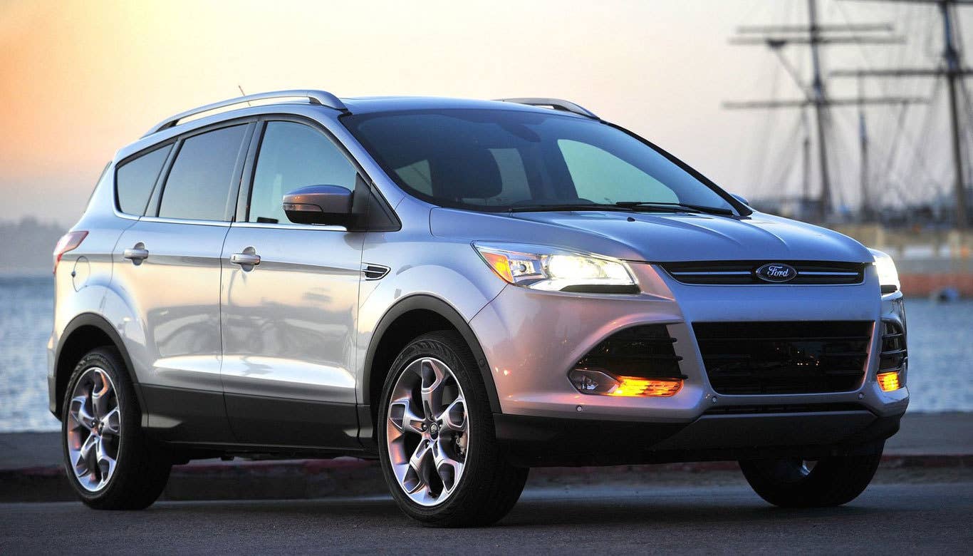 Sticker Price: $29,100 - $30,850 Invoice Price: $27,136 - $28,769 Fuel Economy: 22 mpg City, 32 mpg Highway  The Ford Escape has been plagued by several recalls, but is still the best American small SUV, according to Consumer Reports. Handsome, versatile and, with the Titanium trim, loaded with features, it's a pretty great choice for the CUV crowd.  Research the Ford Escape Ford Escape Overview Ford Escape Photos & Video Ford Escape Titanium Local Dealer Price Quote