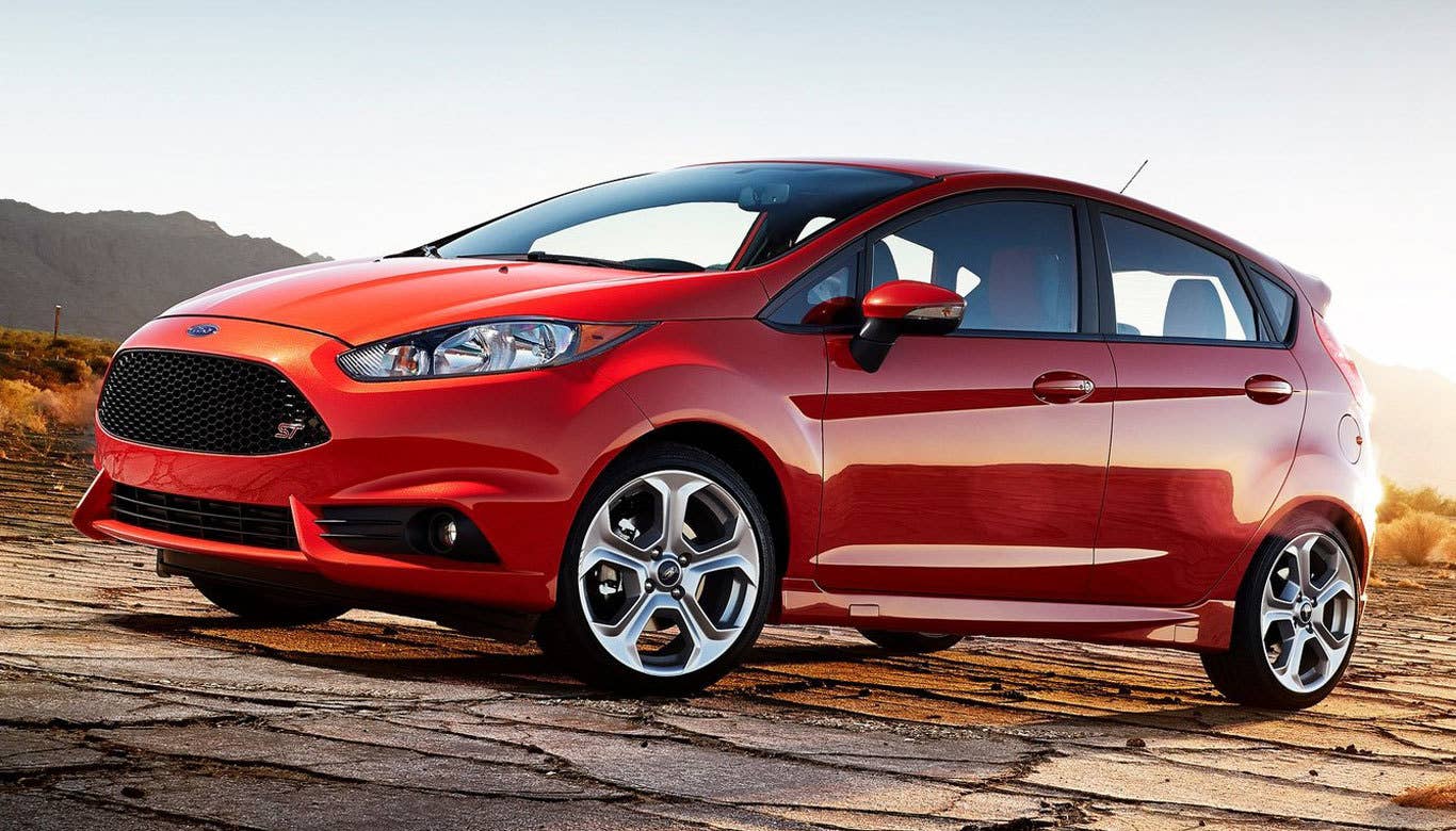 Sticker Price: $21,400 Invoice Price: $20,598 Fuel Economy: 26 mpg City, 35 mpg Highway  Simply put, theFord Fiesta ST is awesome. Affordable, crazy fun to drive and fuel efficient, this little hatchback is a heck of a lot of bang for the buck. It even beat out its bigger sibling, the Ford Focus ST, for the sports car pick on the Consumer Reports list.  Research the Ford Fiesta ST Ford Fiesta ST Overview Ford Fiesta ST Photos & Video Ford Fiesta ST Local Dealer Price Quote