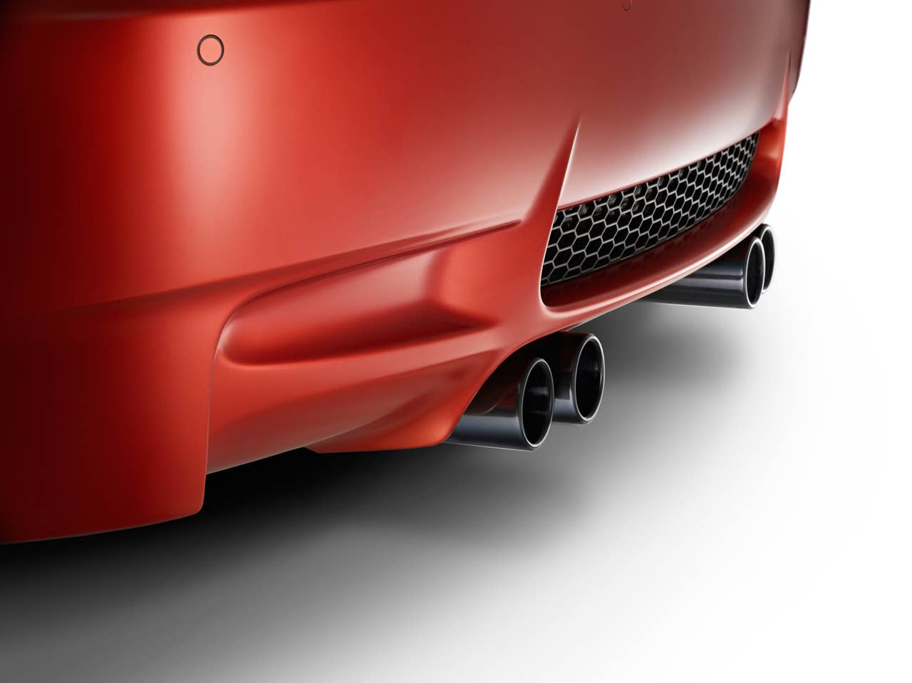 2013 BMW M3 Coupe Frozen Limited Edition rear fascia and exhaust detail in red