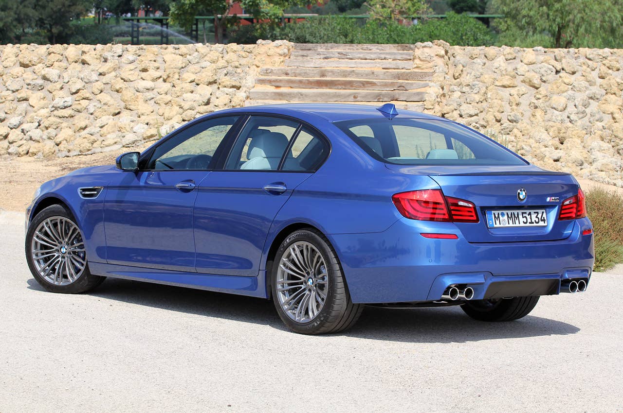 2012 BMW M5 rear 3/4 view