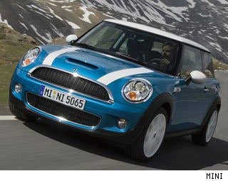 MSRP: $19,500 - $24,950 Invoice: $17,550 - $22,455 Fuel Economy: 29 mpg city, 37 mpg highway  With great exterior styling and awesome driving dynamics, theMINI Cooper is a favorite of many auto enthusiasts. It also comes with a premium interior and great fuel economy. All in all, it's a fantastic package.  Research the MINI Cooper MINI Cooper Photos & Information MINI Cooper Specs MINI Cooper Local Dealer Price Quote