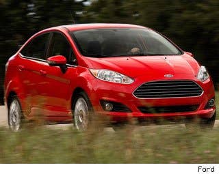 MSRP: $14,000 - $21,400 Invoice: $13,475 - $20,598 Fuel Economy: 29 mpg city, 39 mpg highway  Redesigned for the 2014 model year, the Ford Fiesta echoes the great new design of the Ford Fusion. We really enjoy the Fiesta for its fuel economy, driving dynamics and interior features. If you're feeling fiesty, try the Fiesta ST, which uses a great little turbocharged 1.6L engine. Research the Ford Fiesta Ford Fiesta Photos & Information Ford Fiesta Best Deals Ford Fiesta Local Dealer Price Quote