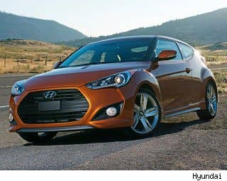 MSRP: $17,600 - $22,100 Invoice: $16,983 - $21,038 Fuel Economy: 27 mpg city, 37 mpg highway  The Hyundai Veloster is an interesting vehicle, namely because of its strange look and name and the fact that it comes with three doors -- 1 on the driver's side and 2 on the passenger. This is a great car to drive and it comes with tons of standard features. If you're feeling sporty, you should check out the Veloster Turbo which adds some more horsepower to the equation. Research the Hyundai Veloster Hyundai Veloster Photos & Information Hyundai Veloster Best Deals Hyundai Veloster Local Dealer Price Quote