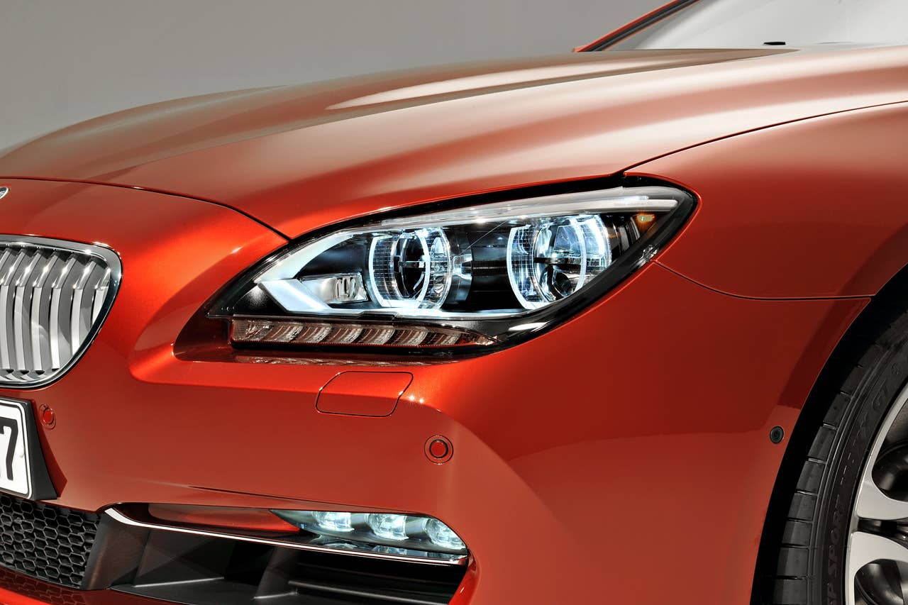The new BMW 6 Series Coupe - Exterior, Adaptive LED Headlights for low and high beam, including cornering function, foglamps with LED technology. Lights on (03/2011).