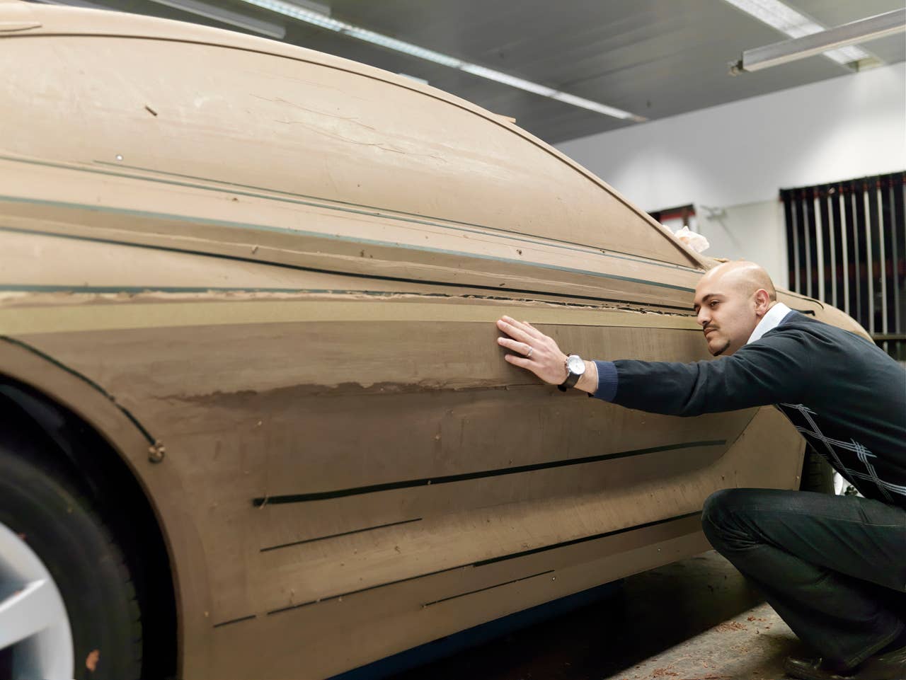 Nader Faghizadeh (Exterior Designer BMW 6 Series Coupe) at a BMW 6 Series Coupe clay model (03/2011).