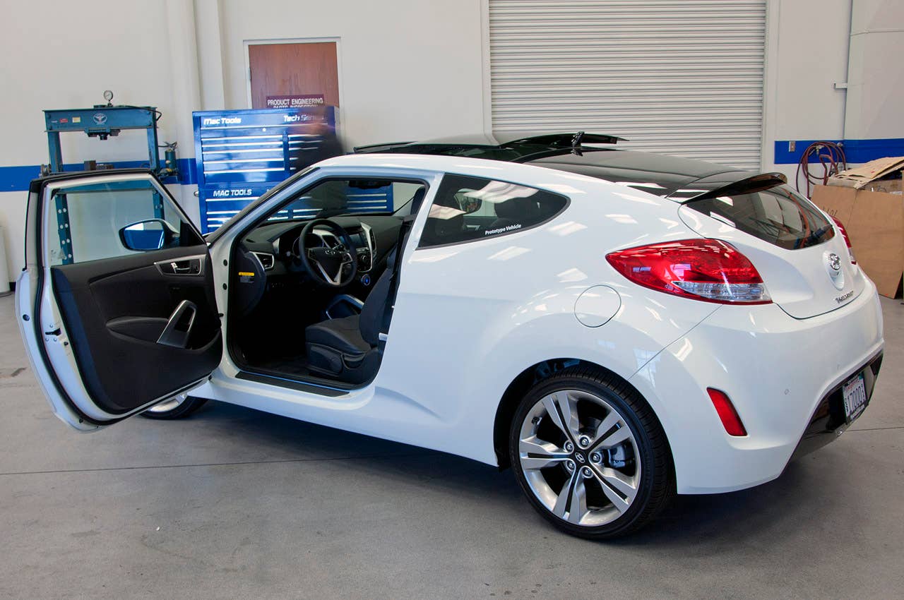 2012 Hyundai Veloster rear 3/4 view
