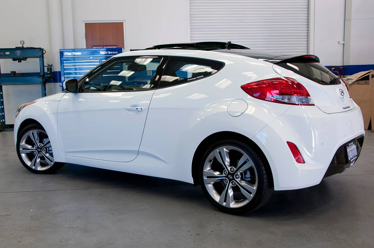 2012 Hyundai Veloster rear 3/4 view