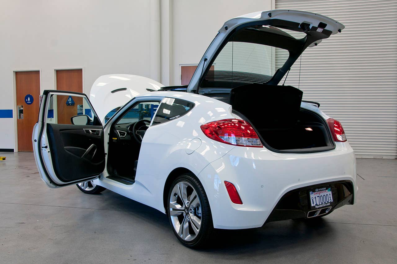 2012 Hyundai Veloster rear 3/4 view