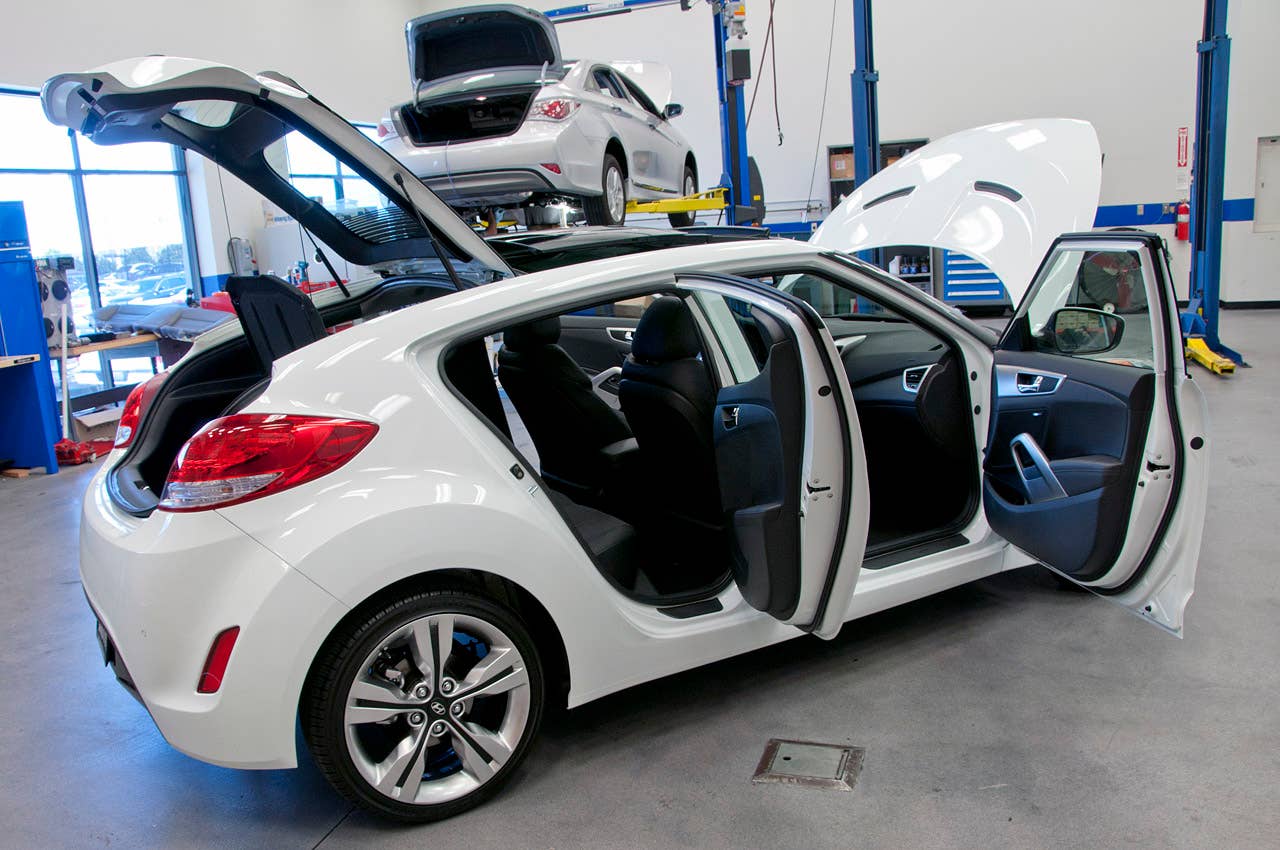 2012 Hyundai Veloster rear 3/4 view