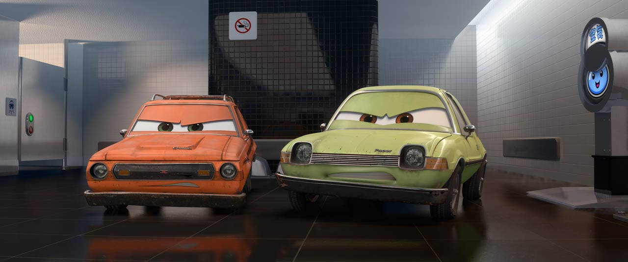 CARS 2: (L-R) Grem (voice by Joe Mantegna), Acer (voice by Peter Jacobson)