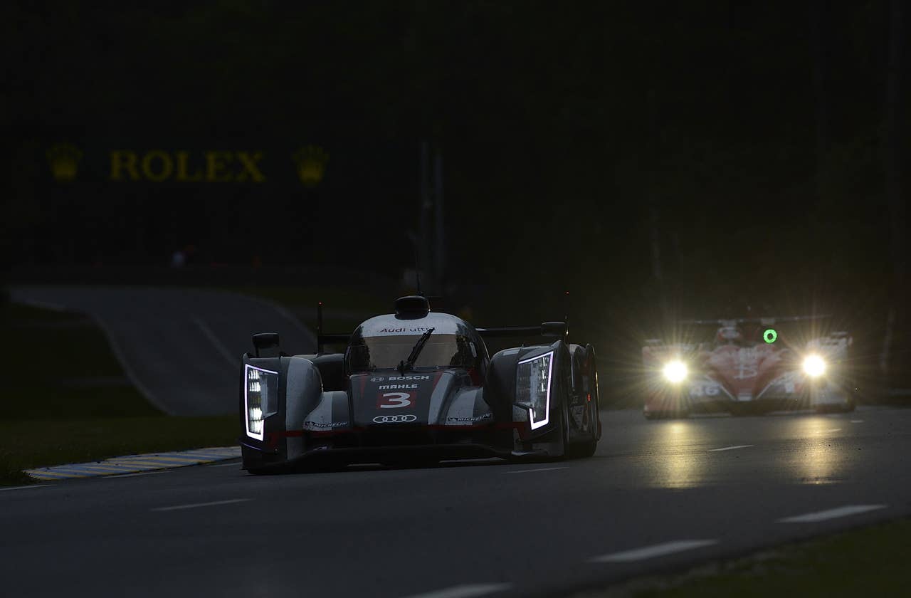 LE MANS, FRANCE - JUNE 14:  The #3 Audi R18 ultra driven by Marc Gene of Spain, Romain Dumas of France, and Loic Duval of France, during qualifying for the 80th running of the Le Mans 24 Hour race at the Circuit des 24 Heures du Mans  on June 14, 2012 in Le Mans, France.  (Photo by Rick Dole/Getty Images)