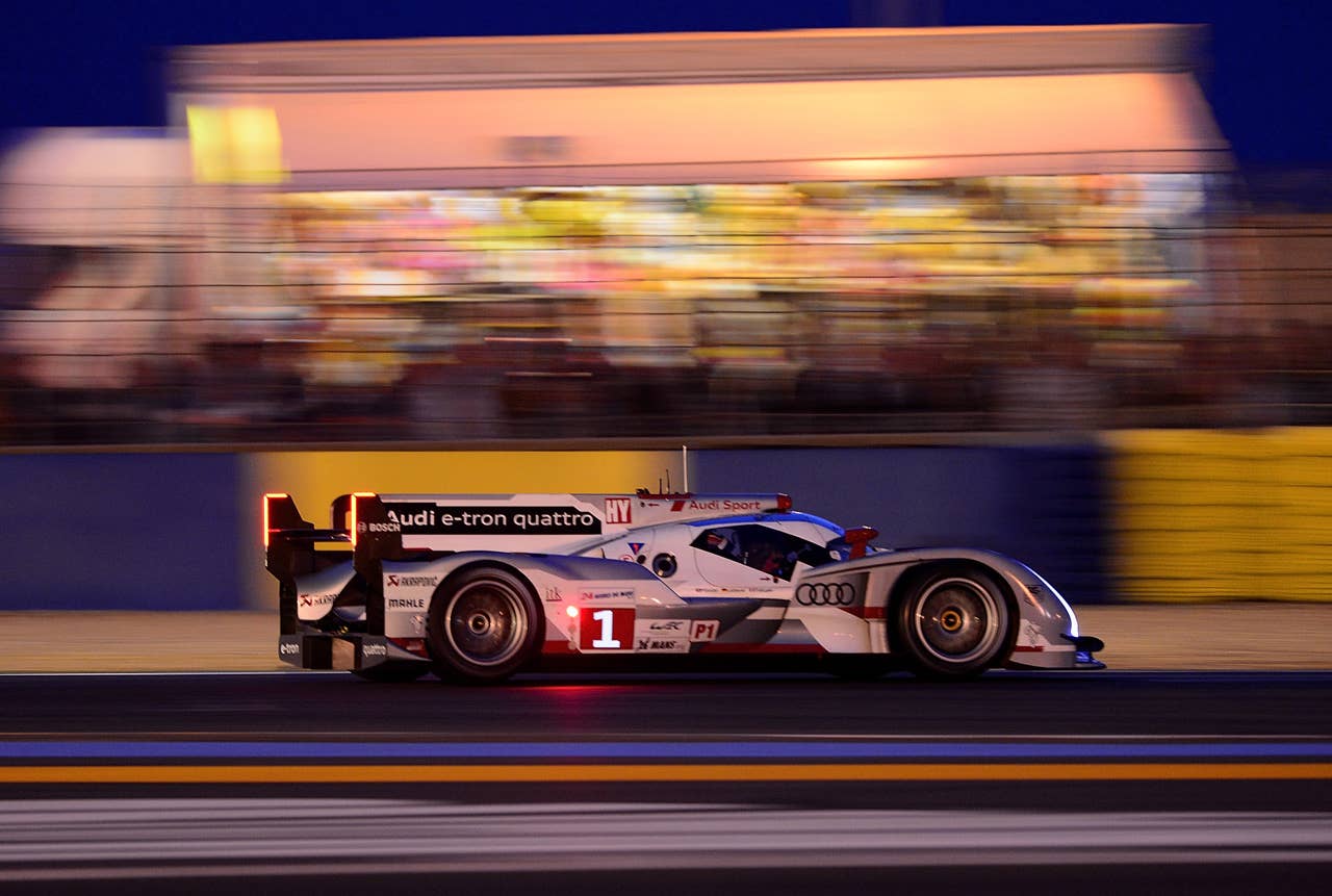 LE MANS, FRANCE - JUNE 14:  Andre Lotterer of Germany and driver of the #1 Audi R18 e-tron quattro captures pole position during qualifying for the 80th running of the Le Mans 24 Hour race at the Circuit des 24 Heures du Mans  on June 14, 2012 in Le Mans, France.  (Photo by Rick Dole/Getty Images)