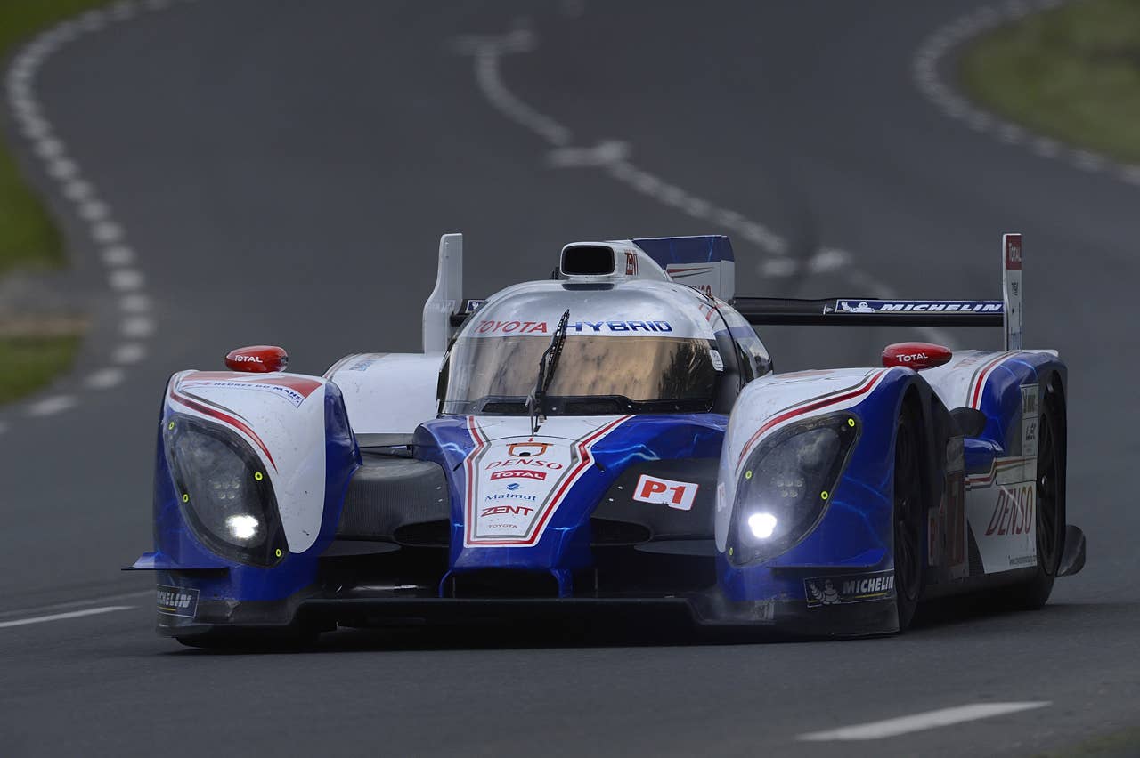LE MANS, FRANCE - JUNE 13:  The Toyota TS030 Hybrid driven by Nicolas Lapierre of France, Kazuki Nakajimi of Japan, and Alexander Wurz of Austria during practice  for the 80th running of the Le Mans 24 Hour race at the Circuit des 24 Heures du Mans  on June 13, 2012 in Le Mans, France  (Photo by Rick Dole/Getty Images)