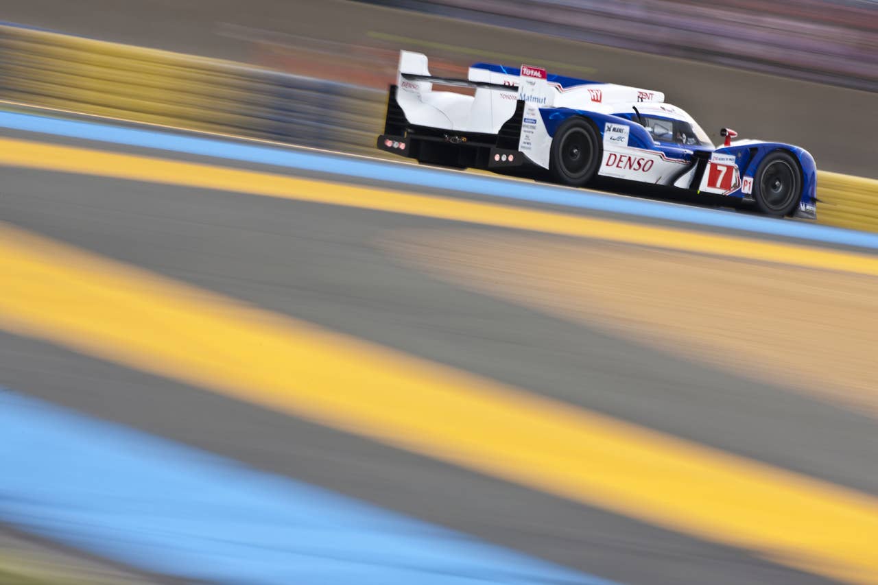 LE MANS, FRANCE - JUNE 14:  The Toyota Racing Toyota TS 030 - Hybrid driven by Alexander Wurz of Austria, Nicolas Lapierre of France and Kazuki Nakajima of Japan during qualifying for the 80th running of the Le Mans 24 Hour race at the Circuit des 24 Heures du Mans on June 14, 2012 in Le Mans, France  (Photo by Drew Gibson/Getty Images)