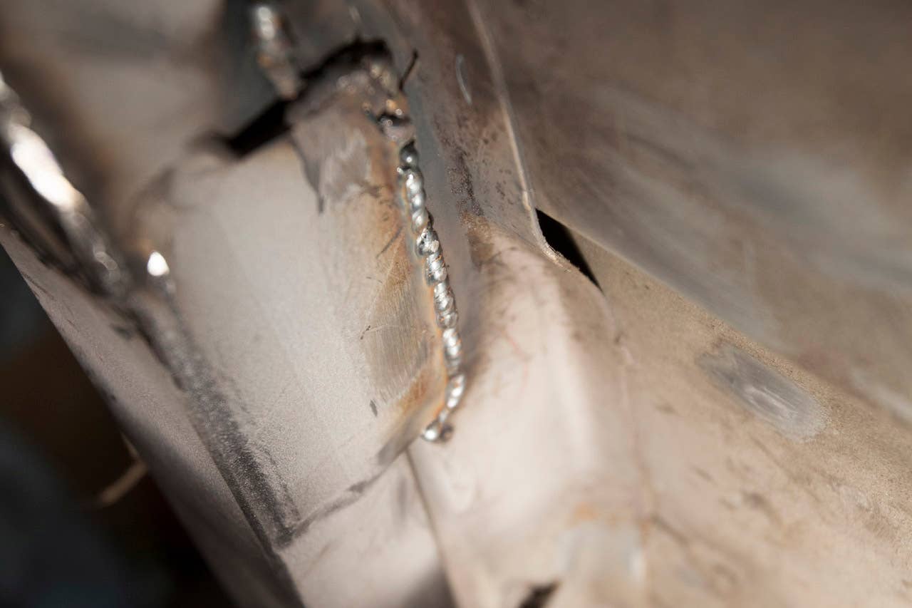 Welding in Maximum Motorsports subframe connectors.