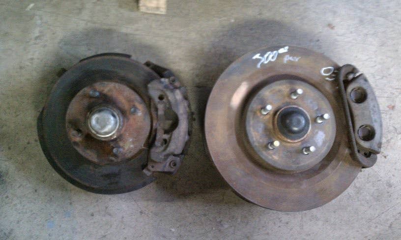 Factory 1989 Mustang brakes (left) with 2003 Mustang Mach I brakes (right)