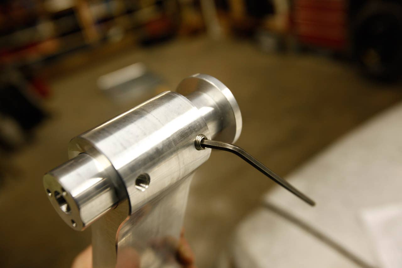 This particular piece is adjustable front to rear thanks to a pair of set screws.