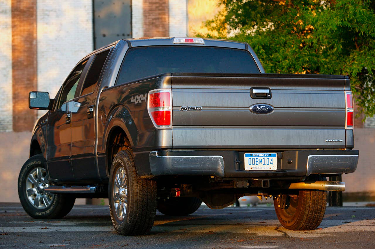 2011 Ford F-150 4x4 SuperCrew rear 3/4 view