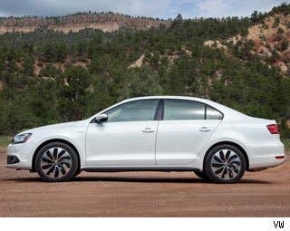 The 2013 Volkswagen Jetta Hybrid is undoubtedly one of the most fun-to-drive hybrids on the road today and, for the price, it's a great value. Unfortunately, the regenerative braking takes away from the driving experience a little bit (which is unavoidable) and you're going to spend a little more having to use premium gas, but with solid fuel economy numbers and a great overall driving experience, I'd recommend this car to anyone.  If you're looking to save money on gasoline without compromising much in the way of driving dynamics, interior space, comfort and MSRP, the Jetta Hybrid is for you.  AOL Autos Score:   4/5 Stars   Research the Volkswagen Jetta Hybrid Volkswagen Jetta Hybrid Photos & Information Volkswagen Jetta Hybrid Best Deals Volkswagen Jetta Hybrid Local Dealer Price Quote