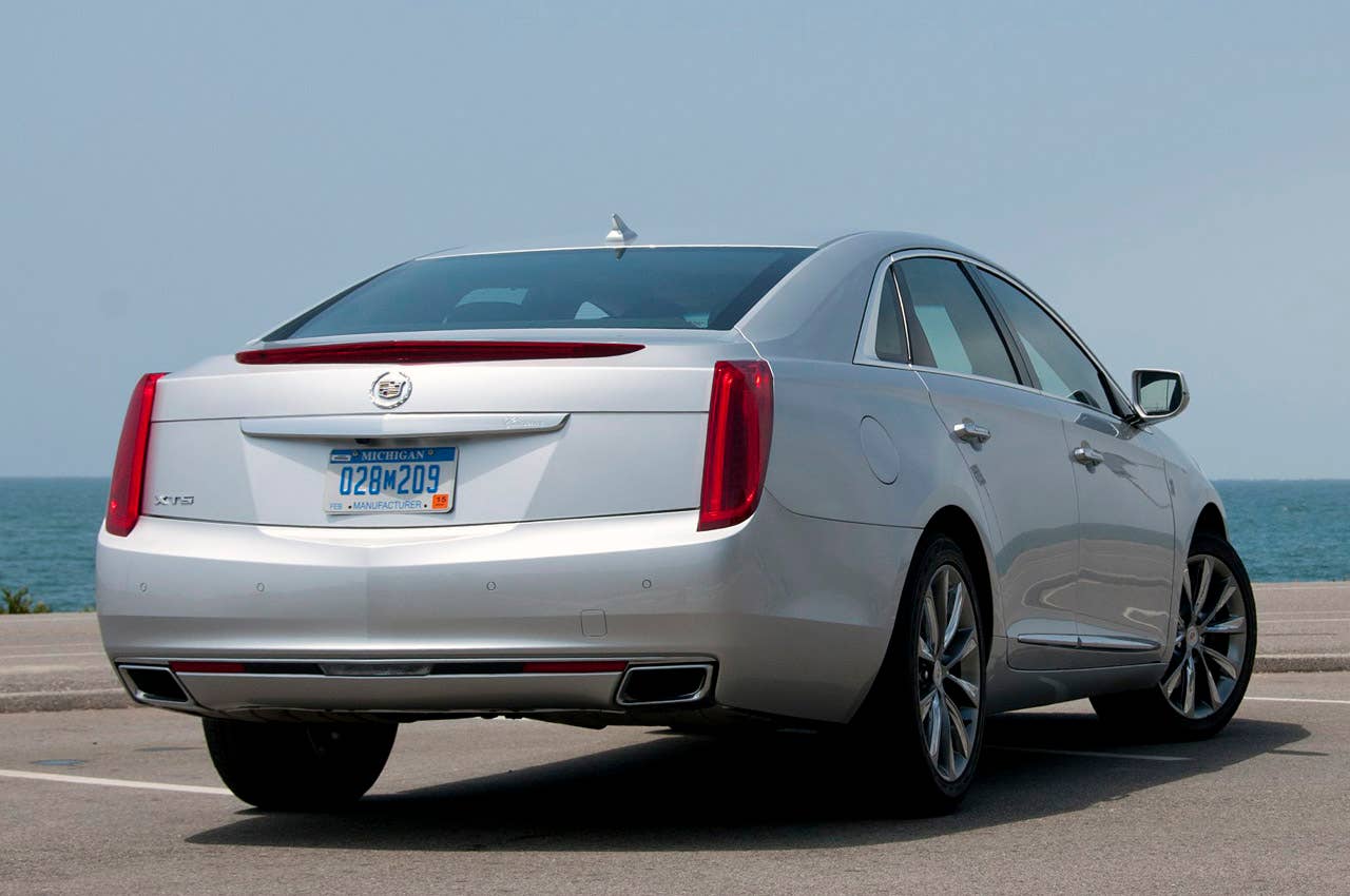 2013 Cadillac XTS rear 3/4 view