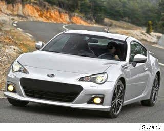 Base MSRP: $25,495 Invoice: $24,327 Fuel Economy: 22 mpg City, 30 mpg Highway  TheSubaru BRZ is one of the best cars I have driven all year. It doesn't look like much on paper, I know (200 hp, 151 lb-ft of torque), but do not be fooled.  The fact is that the BRZ's lightweight body and stellar dynamics make this one of the most fun cars to drive in any price range. Taking this on a twisty canyon road (or even a freeway on ramp, for that matter) will push any reservation you may have had about its seeming lack of power right out of your mind. The BRZ's low center of gravity, fantastic gearbox and peppy boxer engine make it an utter delight to drive. I guarantee you'll crack a smile as soon as you get behind the wheel.  And what makes the BRZ even cooler is its look. The Subaru-Toyota partnership that produced the BRZ as well as the Scion FRS nailed the aesthetics. The aggressive stance coupled with its mean front end and fluid lines make this one of the sharper looking cars on the road.  The BRZ starts at $25,495 and comes in two different trims, Premium and Limited, which both come with lots of options and a surprising amount of versatility. You can't really lug around your family, but a couple of golf bags and groceries won't be a problem.   Take all of that and combine it with 30 mpg Highway and you've got one very cool car.  Research the Subaru BRZ Subaru BRZ Photos & Information Subaru BRZ Best Deals Subaru BRZ Local Dealer Price Quote