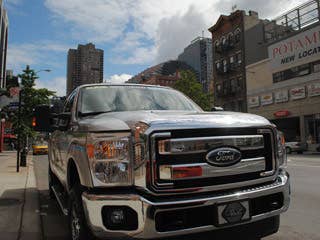 The goal was pretty straightforward. Drive from New York City to Detroit– just more than 600 miles – in a Ford F-250 and not use a single drop of gas; well, at least not of the unnatural kind most people put in their tank. No, this big rig, which looked like a giant Ford billboard, would be powered by compressed natural gas. CNG is all the rage again. Carmakers are looking for alternative ways to provide transportation that is cheaper, cleaner but still provides the same kind of power people need. According to the federal government, 87 percent of natural gas is produced in the U.S., it emits up to 40 percent less greenhouse gases, and has up to 90 percent less smog-producing pollutants. And other than all of the stickers on this particular truck, it looked like any other F-250. The only difference was about 30 percent of the bed was taken up with a tank that could hold 3,600 pounds of CNG.