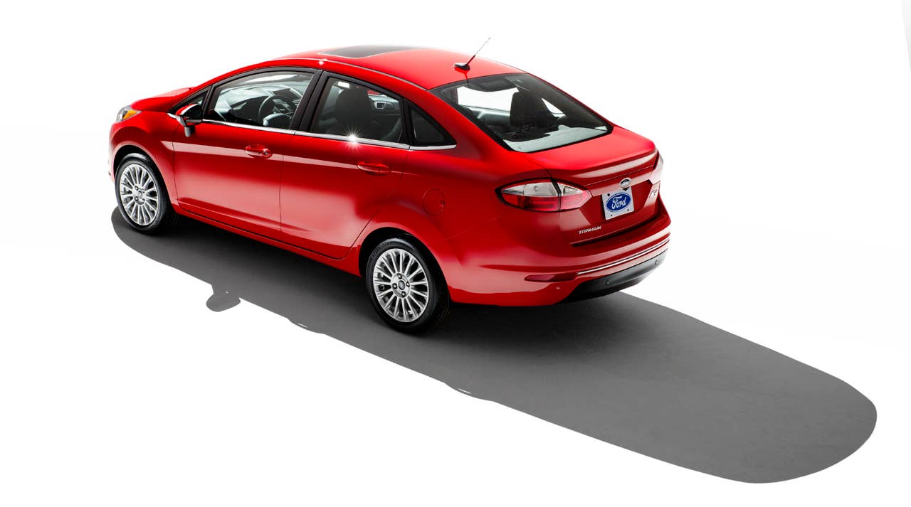 2013 Ford Fiesta sedan (global) rear 3/4