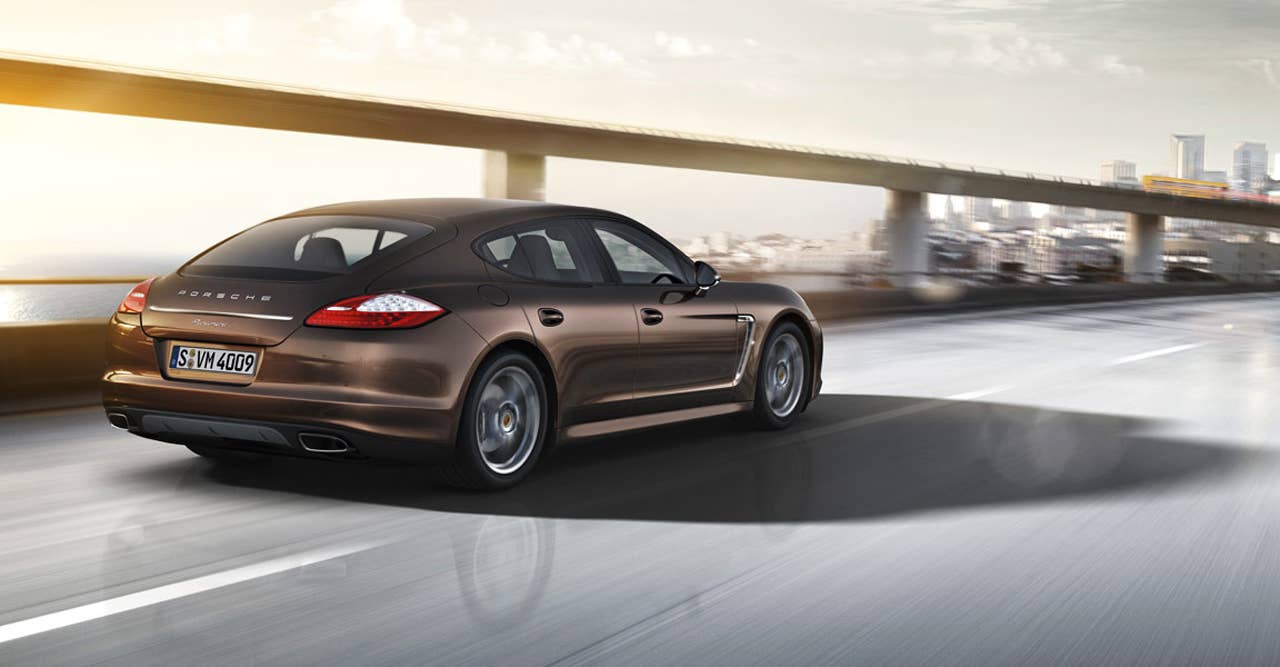 2013 Porsche Panamera Platinum Edition rear 3/4 driving