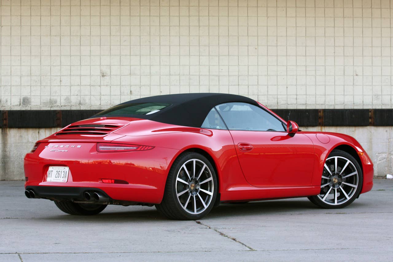 2012 Porsche 911 Carrera Cabriolet rear 3/4 with the top up