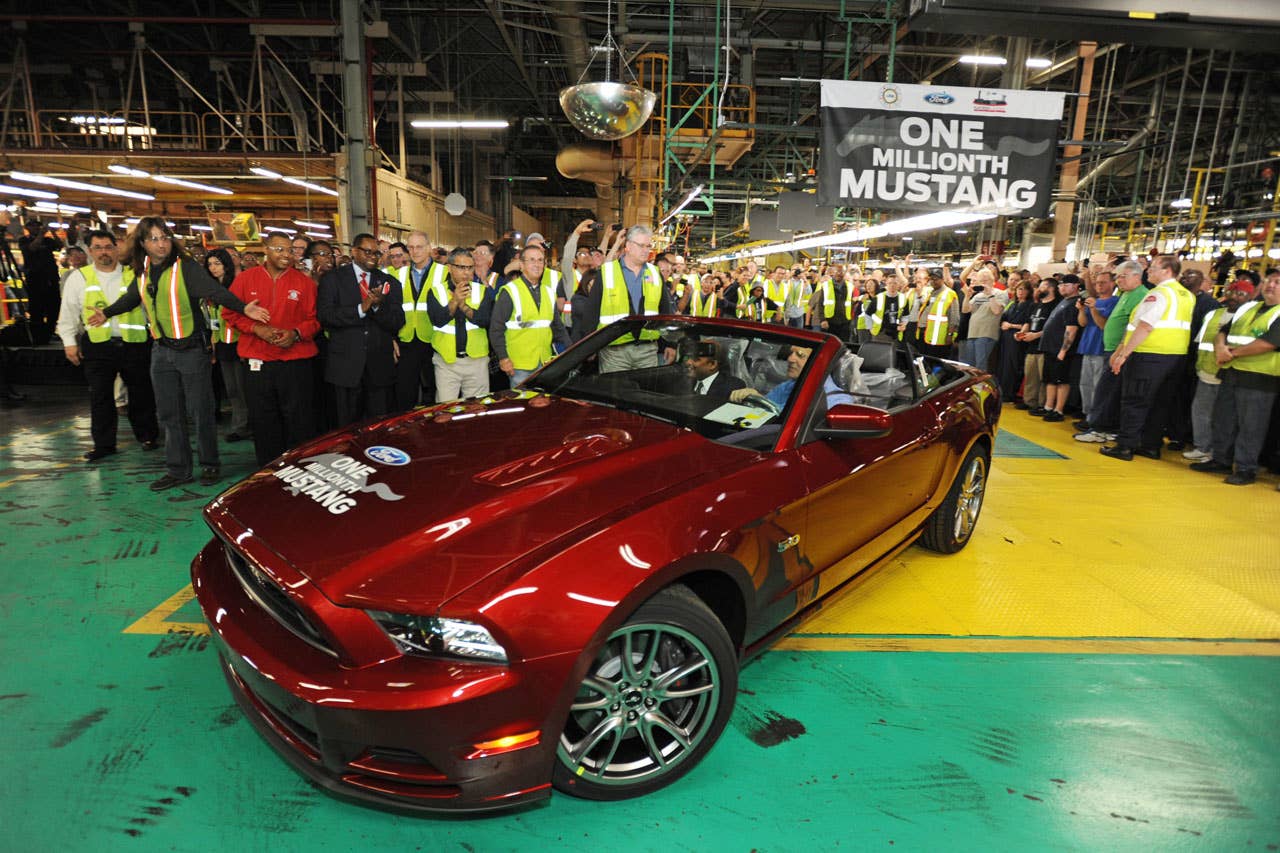 Flatrock, Mi. Flat Rock Assembly Plants most senior Ford employee, Ed Salna, drives the 1 millionth Mustang off the line with Raj Nair, group vice president for product development at the Flat Rock Assembly Plant. (04/17/2013)