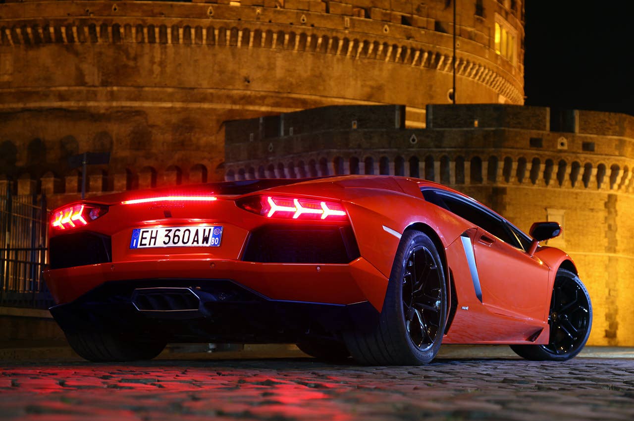 2012 Lamborghini Aventador LP700-4 rear 3/4 view