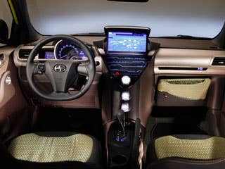 Scion is calling the iQ "premium," giving notice that the vehicle won't simply be a cheap city car and nothing else. In keeping with the Scion brand, the audio system is significantly better than what you'd find in comparable vehicles. The iQ will come standard with a six-speaker system, USB and iPod ports and steering-wheel audio controls. The car is also packed with safety features, including 10 airbags (among them: a rear-window curtain airbag and a driver seat-cushion airbag), anti-lock brakes and stability control.More related to Scion iQ:Research All Scion VehiclesCheap Hybrid CarsResearch All Hatchbacks