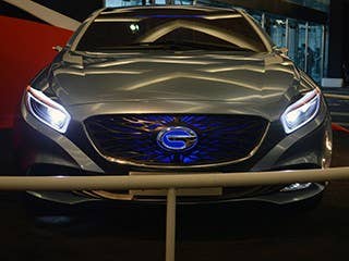 AutoBlog says: GAC's E-jet Concept was not far off what we'd expect from more established automakers at a big show, with a generally pleasing shape and some cool detailing on the grille and rear valence. The E-jet is set up as a Voltesque range-extended hybrid, with a 1.0-liter, four-cylinder gasoline engine acting as a generator for an electric drive motor.