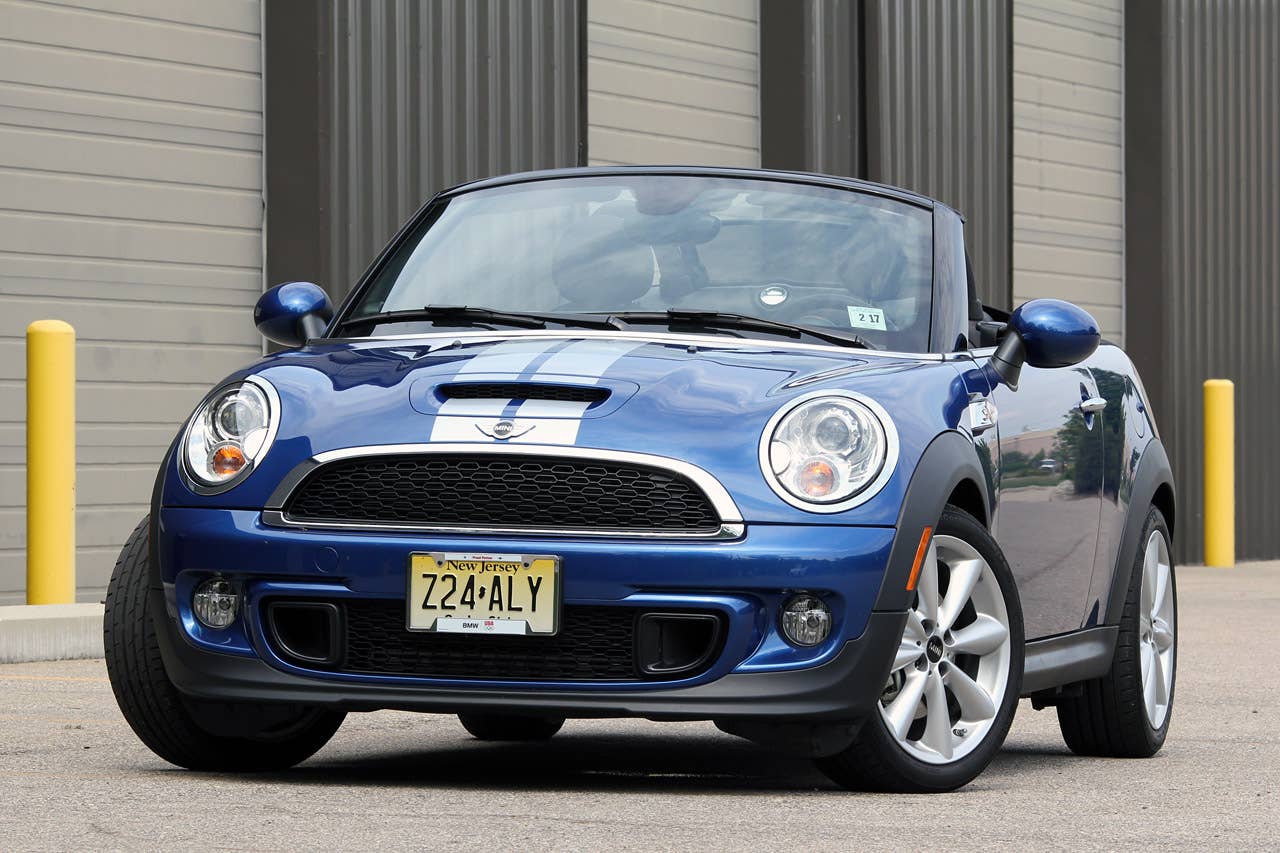 2012 Mini Cooper S Roadster Article:2012 Mini Cooper S Roadster vs. 2012 Mazda MX-5 Miata Special Edition Copyright 2012 John Neff / AOL