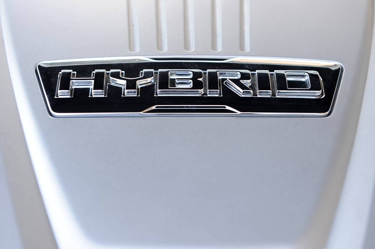 2011 Kia Optima Hybrid engine badge