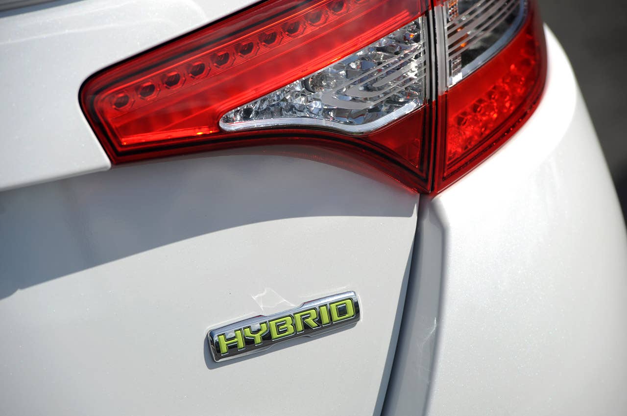 2011 Kia Optima Hybrid badge