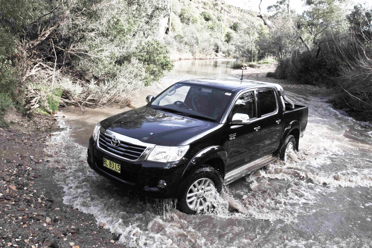 Toyota Hilux at a stream crossing
