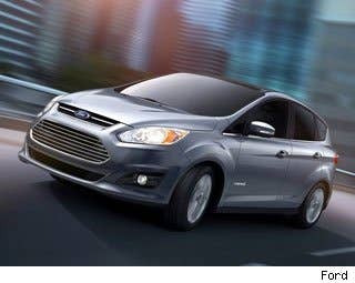 Ford is introducing a slew of new advance-powertrain models over the next year. These include full hybrid, plug-in hybrid and all-electric vehicles. One of the first to arrive is the all-new C-Max Hybrid, which has the Prius, specifically the Prius V, aligned in its crosshairs.  Thanks to its high roofline (63.9 inches), the Ford boasts 52.6 cubic feet of space behind the first row and 24.5 cubic feet behind the second row. It also offers more headroom in both the front and rear seats than the Prius V (41.0 and 39.4 inches, versus 39.6 and 38.6 inches), according to Ford. Add it all up, and the C-Max Hybrid offers 99.7 cubic feet of passenger space (the Prius V offers slightly less at 97.0 cubic feet). The C-Max's standard five-place cabin also features a 60/40 split-fold-flat second row, designed with one-handed operation in mind, for additional utility.  Under the front hood of the 2013 Ford C-Max Hybrid is a naturally aspirated 2.0-liter Atkinson cycle gasoline-fed inline four-cylinder rated at 141 horsepower that has been mated to a 35-kW permanent magnet AC synchronous electric motor for a combined system power of 188 horsepower.  The C-Max Hybrid earns 47 miles per gallon in the city and 47 mpg highway (47 combined), while the Prius V earns 44 mpg city and 40 mpg highway (42 combined). Thanks to its 13.5-gallon fuel tank, the C-Max will deliver a 570-mile cruising range