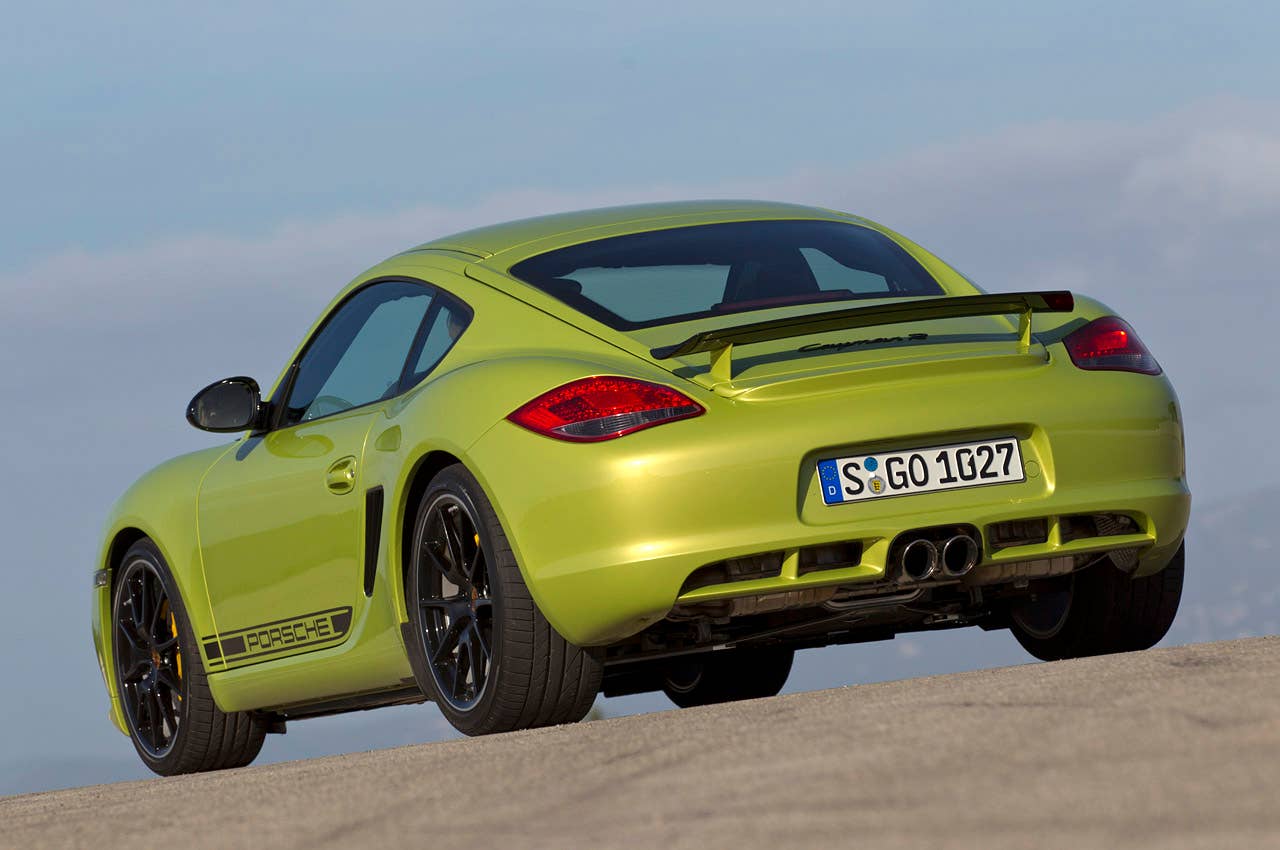 2011 Porsche Cayman R rear 3/4 view