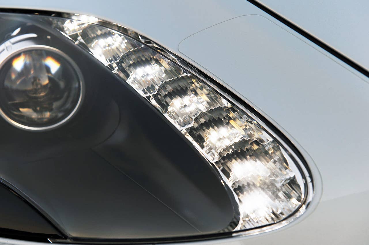 2011 Aston Martin V12 Vantage headlight detail