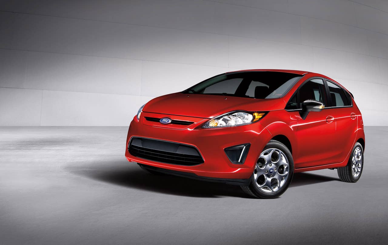 Ford Fiesta launches three new personalization packages for 2012, including two interior packages and one exterior package offering customers the ultimate in customization. Shown here is the new premium sport appearance exterior package, inspired by the European Ford Focus RS, it offers customers race-inspired blacked-out accessories, along with a sportier performance. (03/23/2011)