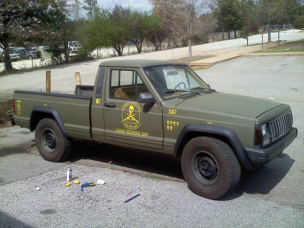 Zombie 1988 Jeep Comanche Pioneer with graphics