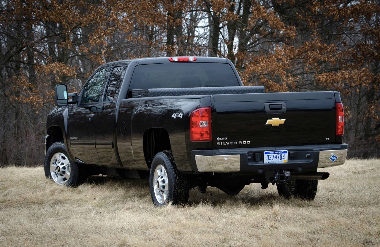 The 2013 bi-fuel Chevrolet Silverado HD includes a compressed natural gas (CNG) capable engine that seamlessly transitions between CNG and gas fuel systems. The bi-fuel Silverado HD will be covered by General Motors' extensive warranty, and will meet all EPA and CARB emission certification requirements. (Photo by James Fassinger for Chevrolet)