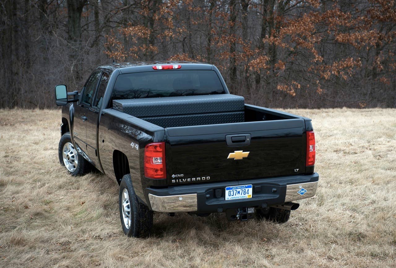 The 2013 bi-fuel Chevrolet Silverado HD includes a compressed natural gas (CNG) capable engine that seamlessly transitions between CNG and gas fuel systems. The bi-fuel Silverado HD will be covered by General Motors' extensive warranty, and will meet all EPA and CARB emission certification requirements. (Photo by James Fassinger for Chevrolet)
